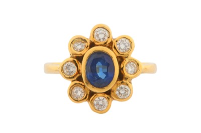 Lot 2 - A SAPPHIRE AND DIAMOND CLUSTER RING