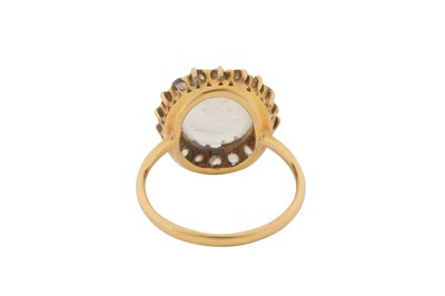 Lot 30 - A MOONSTONE AND DIAMOND CLUSTER RING