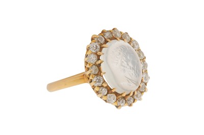 Lot 30 - A MOONSTONE AND DIAMOND CLUSTER RING