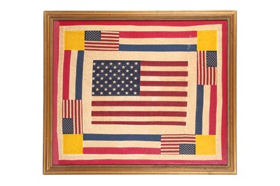 Lot 452 - A FRAMED AMERICAN FLAG PATCHWORK QUILT