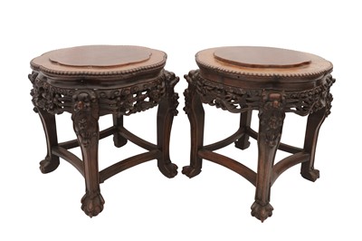 Lot 69 - A PAIR OF CHINESE HARDWOOD STANDS / STOOLS