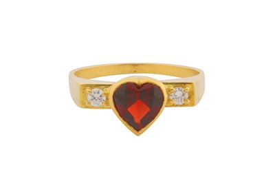 Lot 141 - A GARNET AND DIAMOND THREE-STONE RING