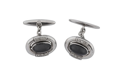 Lot 324 - A PAIR OF OVAL SAPPHIRE AND DIAMOND CUFFLINKS