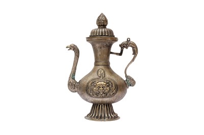 Lot 175 - A TIBETAN BRONZE EWER AND COVER