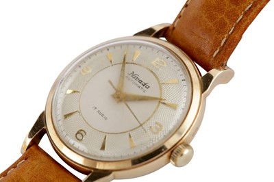 Lot 377 - NIVADA. A VINTAGE 9CT GOLD DRESS WATCH
