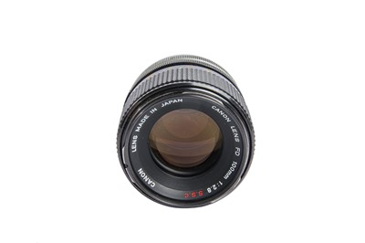Lot 344 - Canon FD 100mm F2.8 S.S.C Lens.