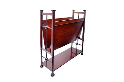 Lot 12 - AN ARTS & CRAFTS MAGAZINE RACK