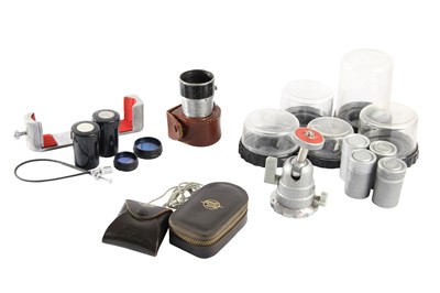 Lot 153 - A Leitz FIKUS Lens Hood & Other Leica Accessories.