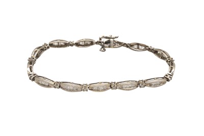 Lot 72 - A DIAMOND LINE BRACELET