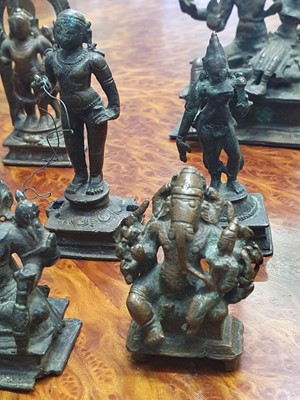 Lot 343 - A MISCELLANEOUS GROUP OF BRONZE HINDU AND BUDDHIST STATUETTES