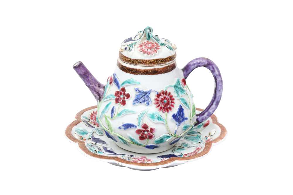 Lot 421 - A CHINESE FAMILLE-ROSE MOULDED 'BLOSSOMS' TEAPOT, COVER AND SAUCER