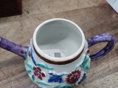 Lot 421 - A CHINESE FAMILLE-ROSE MOULDED 'BLOSSOMS' TEAPOT, COVER AND SAUCER