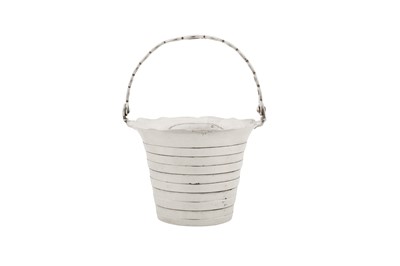 Lot 456 - A George III sterling silver cream pail, London 1770 by Walter Brind (this mark reg. 11th Oct 1757)