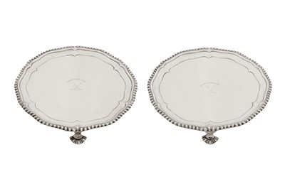 Lot 407 - A pair of George III Scottish sterling silver waiters, Edinburgh 1773 by Alexander Gardner