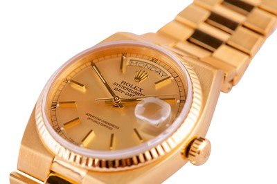 Lot 402 - ROLEX. DAY-DATE OYSTERQUARTZ BRACELET WATCH