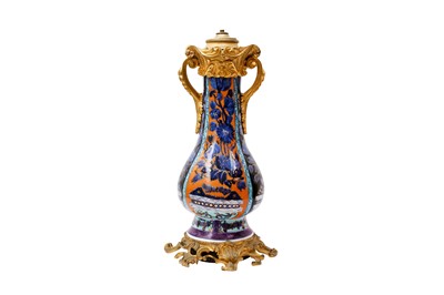 Lot 254 - A CHINESE CLOBBERED BLUE AND WHITE ORMOLU-MOUNTED VASE