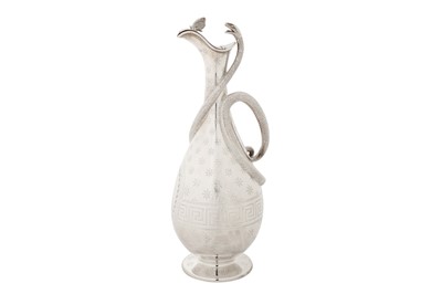 Lot 391 - An interesting Victorian sterling silver claret jug, London 1869 by messrs Barnard