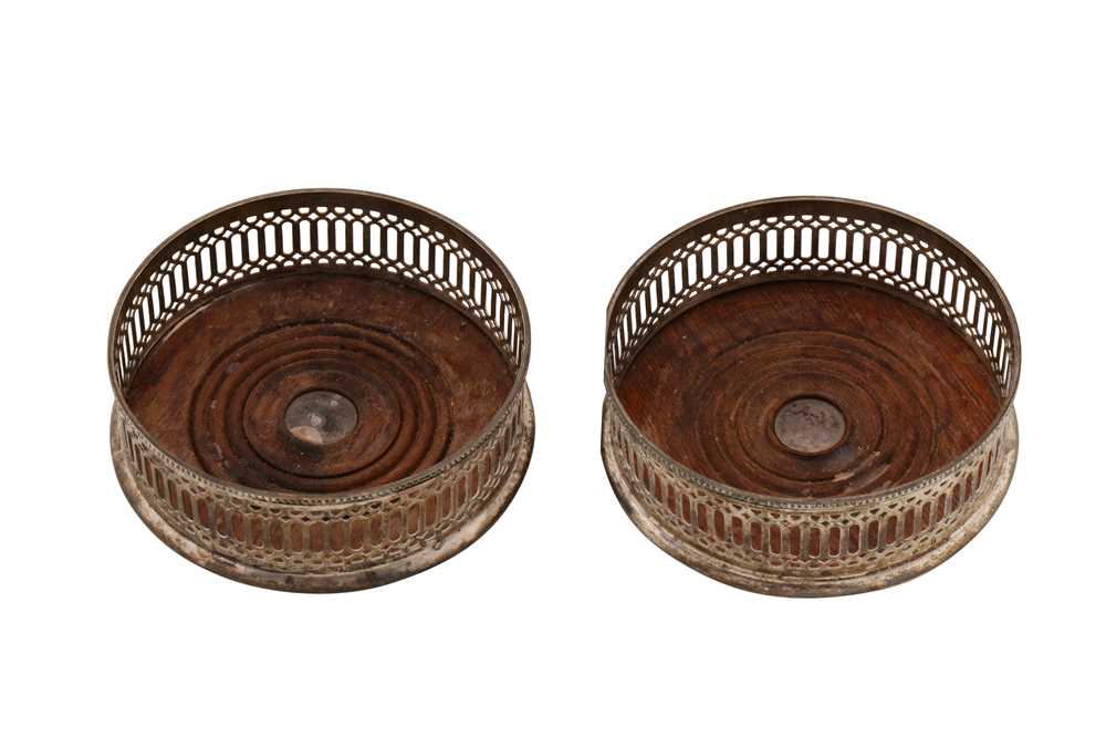 Lot 171 - A pair of Elizabeth II sterling silver wine coasters, London 1972 by Mappin and Webb