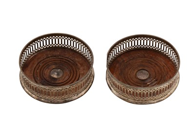 Lot 171 - A pair of Elizabeth II sterling silver wine coasters, London 1972 by Mappin and Webb