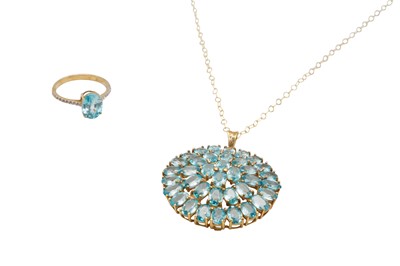 Lot 20 - A 9CT GOLD BLUE ZIRCON PENDANT NECKLACE AND A RING