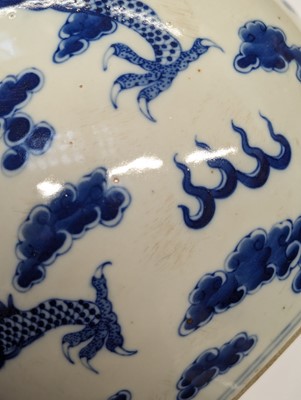 Lot 452 - A CHINESE BLUE AND WHITE 'DRAGONS' VASE