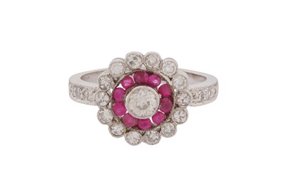 Lot 293 - A DIAMOND AND RUBY CLUSTER RING
