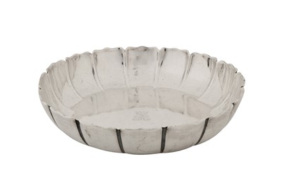 Lot 476 - A George I Britannia standard silver strawberry dish, London 1715 probably by Augustine Courtauld (reg. 23rd Dec 1708)