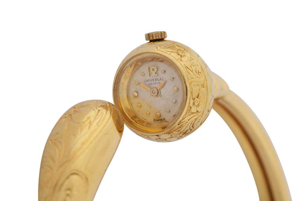 Lot 334 - UNIVERSAL GENEVE. 18CT GOLD BANGLE WATCH