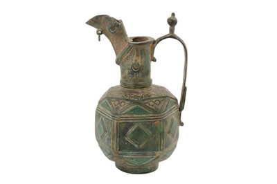 Lot 69 - A RARE AND UNUSUAL 12-13TH CENTURY PERSIAN SELJUK BRONZE EWER