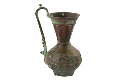 Lot 61 - AN 11TH-12TH CENTURY PERSIAN GHAZNAVID OR SELJUK BRONZE JUG