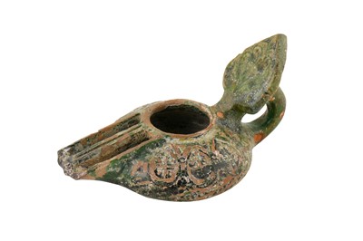 Lot 33 - A RARE 8TH-9TH CENTURY SYRIAN UMAYYAD GREEN GLAZED OIL LAMP