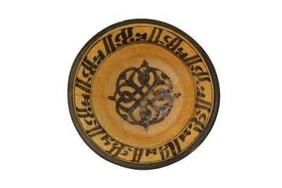 Lot 49 - A 12TH-13TH CENTURY PERSIAN SELJUK GLAZED POTTERY BOWL