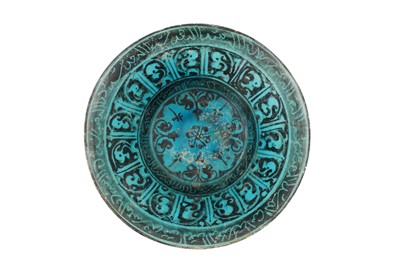 Lot 52 - A 12TH CENTURY PERSIAN KASHAN SILHOUETTE-WARE POTTERY BOWL