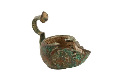 Lot 41 - A 13TH CENTURY PERSIAN SELJUK BRONZE OIL LAMP