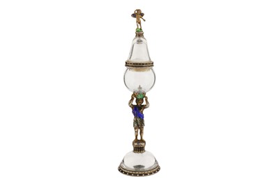 Lot 52 - A late 19th century Austrian 900 standard silver gilt, rock crystal, and enamel figural ornament, Vienna circa 1890 by Simon Grünwald (active 1873-1905)