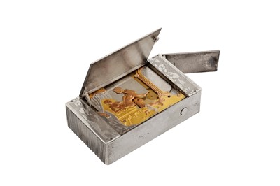 Lot 16 - A late 19th century French silver plated erotic novelty match case, circa 1890