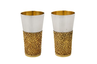 Lot 320 - A pair of Elizabeth II modernist parcel gilt sterling silver beakers, London 1970 by Stuart Devlin (1931-2018)