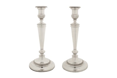 Lot 447 - A pair of George III sterling silver candlesticks, Birmingham 1804 by Matthew Boulton