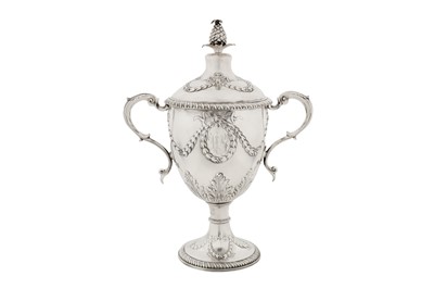Lot 449 - Earl Fortescue – A George III sterling silver twin handled cup and cover, London 1773 by Richard Gardner
