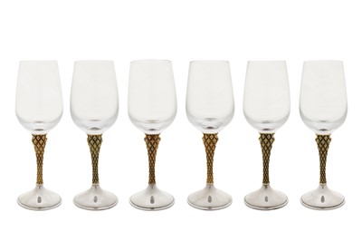 Lot 314 - A cased set of six Elizabeth II modernist parcel gilt sterling silver wine glasses, London 1976 by Anthony Elson for Asprey and Co