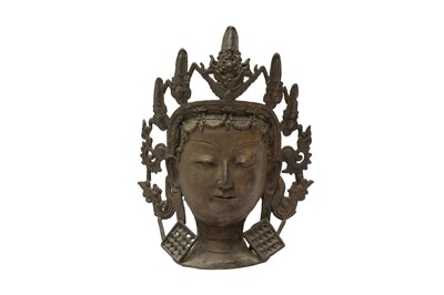 Lot 542 - A TIBETAN BRONZE HEAD OF TARA