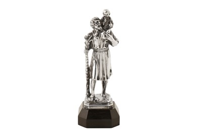 Lot 323 - A George V sterling silver figure of Saint Christopher, London 1929 by Omar Ramsden (1873-1939)