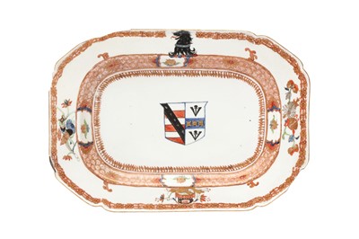 Lot 77 - A CHINESE EXPORT ROUGE-DE-FER AND GILT-ENAMEL ARMORIAL DISH