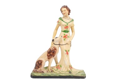Lot 323 - A PAINTED PLASTER FIGURAL GROUP, DEPICTING A LADY WITH HER DOG, MID 20TH CENTURY