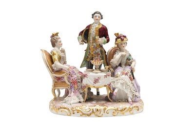 Lot 191 - A DRESDEN PORCELAIN FIGURAL GROUP DEPICTING A TEA PARTY, LATE 19TH CENTURY