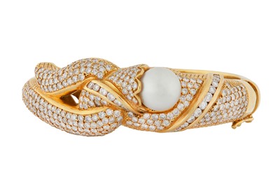 Lot 94 - A PEARL AND DIAMOND BANGLE
