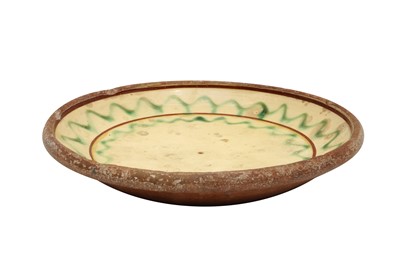 Lot 208 - AN ENGLISH SLIPWARE POTTERY DISH, 19TH CENTURY