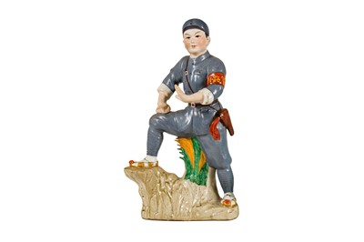 Lot 146 - A Cultural Revolution Era Glazed Bisque Porcelain Figure