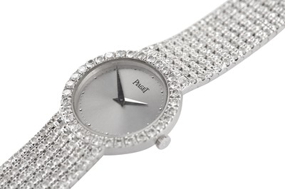 Lot 342 - PIAGET - A FINE DIAMOND-SET BRACELET WATCH