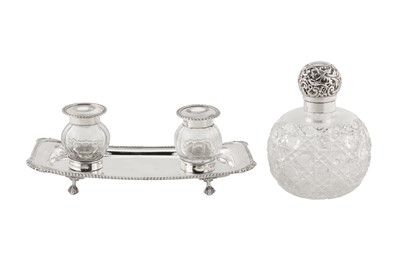 Lot 73 - A Victorian sterling silver mounted glass scent bottle, London 1897 by Sampson Mordan and Co